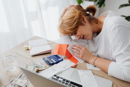 woman overwhelmed by medical debt