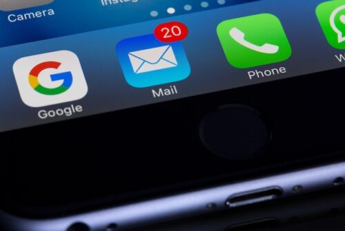 phone screen showing apps and email notification