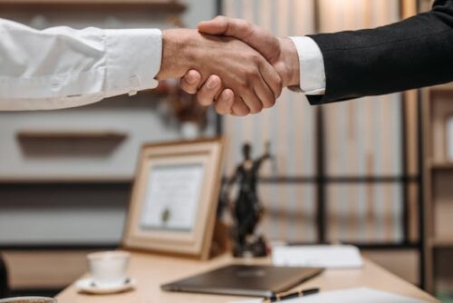 two people shaking hands