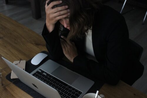 stressed woman at computer