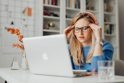stressed woman at computer