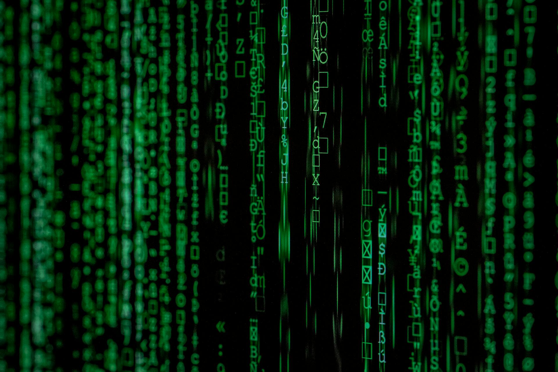 screen with glitchy and green text