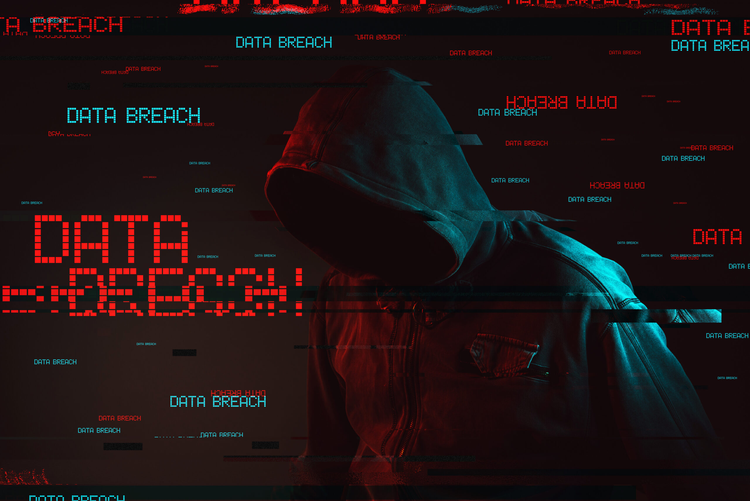 Data breach concept with faceless hooded male person, low key red and blue lit image and digital glitch effect
